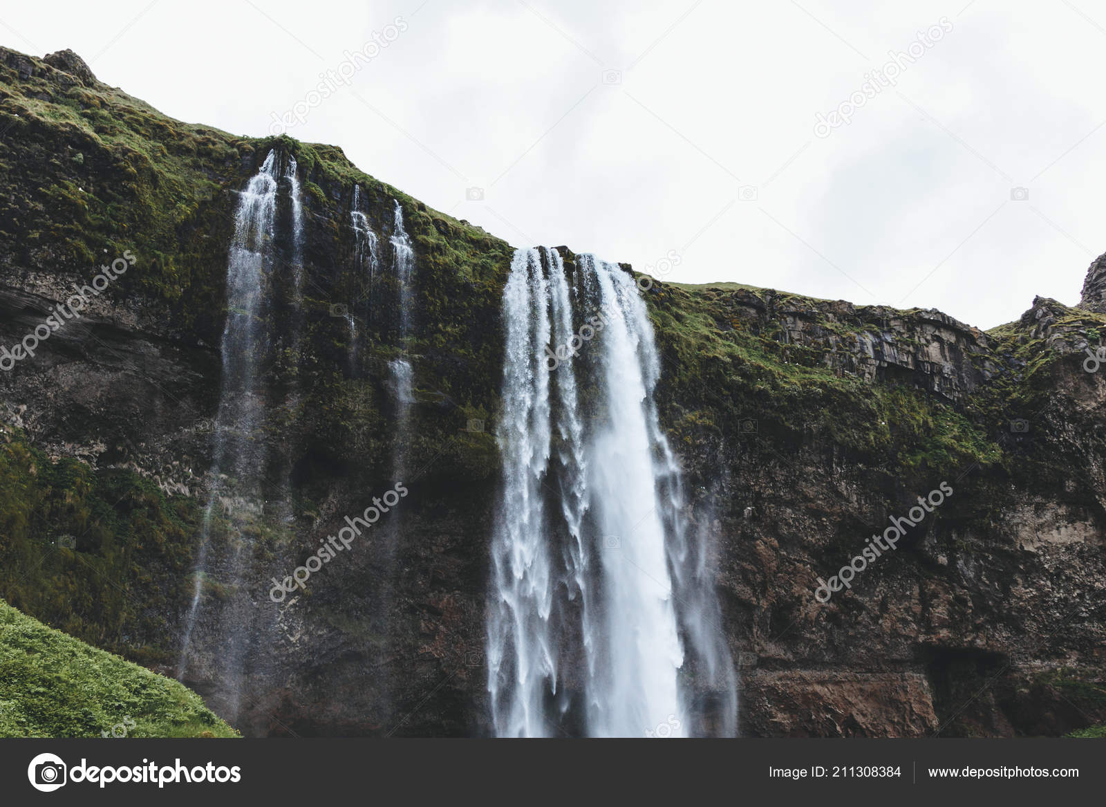 Low angle view of Seljalandsfoss waterfall in highlands in Iceland